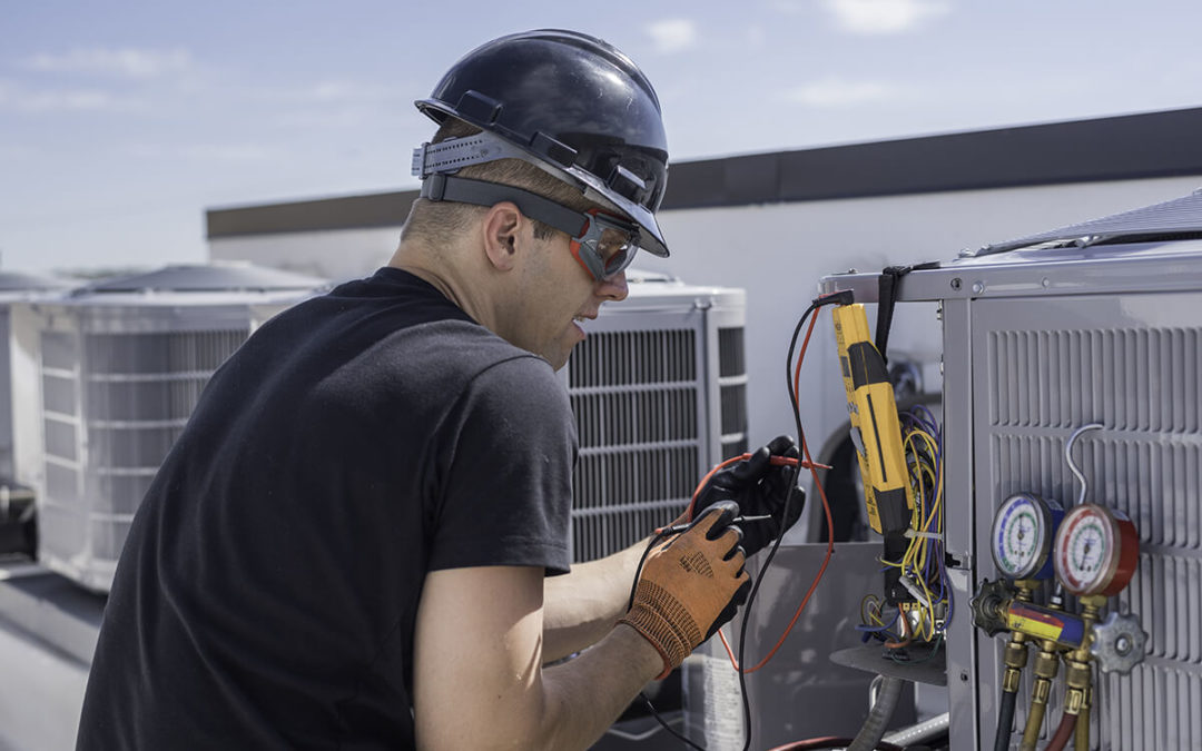 hvac repair man working with tools