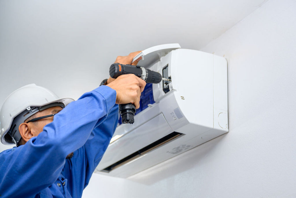 A male air conditioner technician