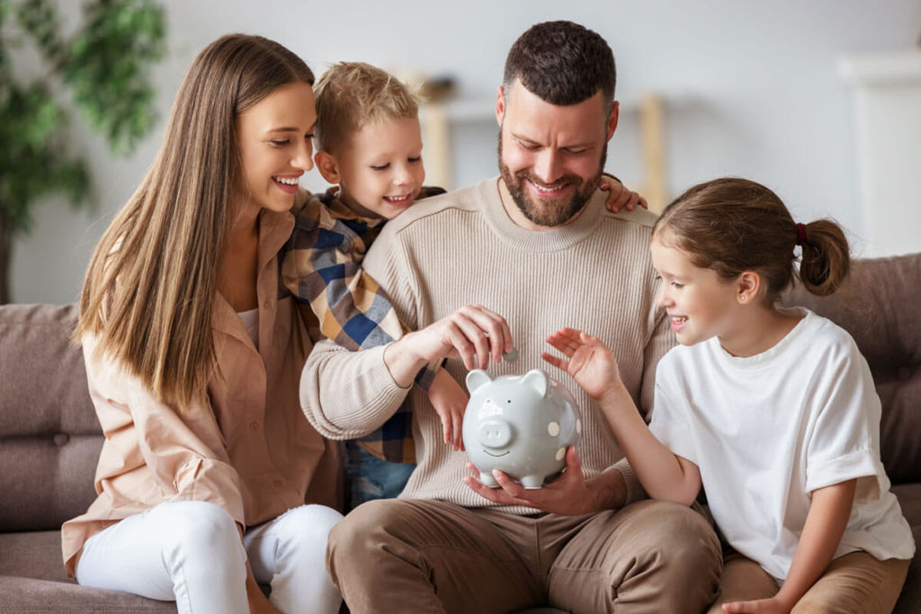 Happy family saving money together Happy family saving money together